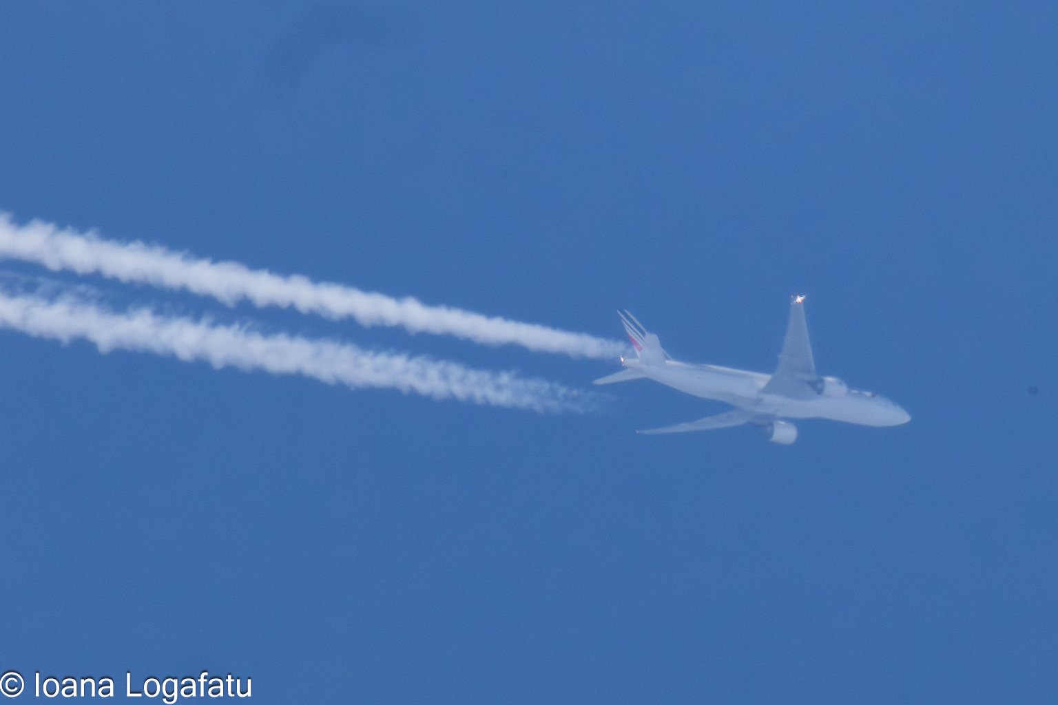 High-flying journey across a clear blue sky